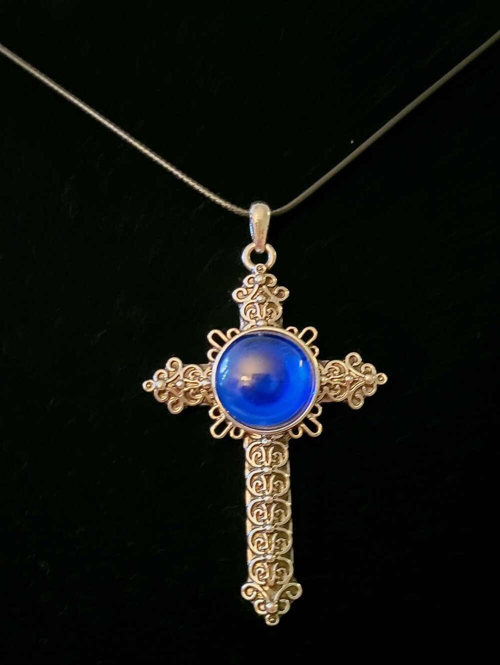 Silver Tone Filigree Cross Necklace with Deep Blue Cabochon Style Stone